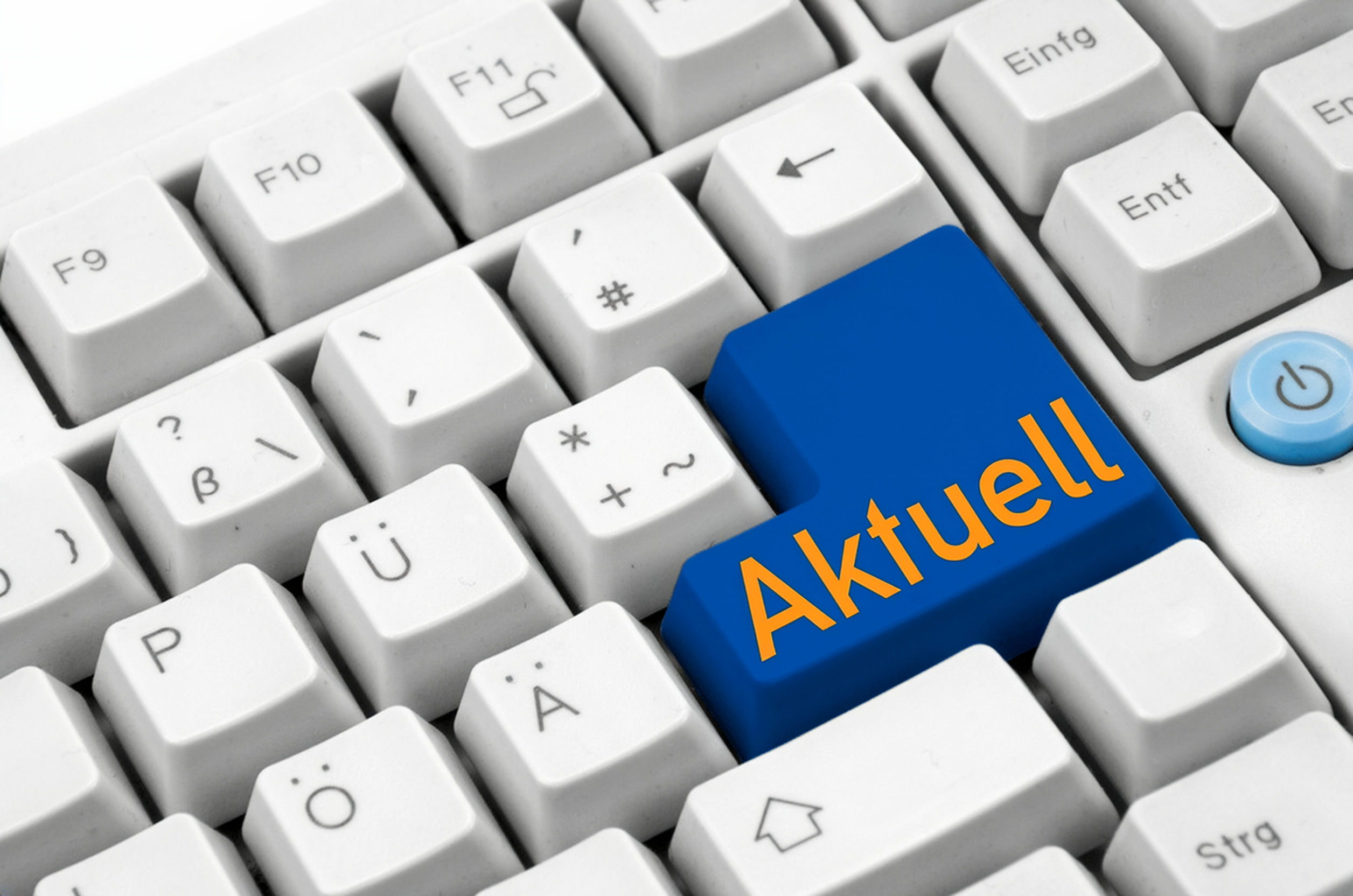 Computertastatur mit dem Schriftzug Aktuell